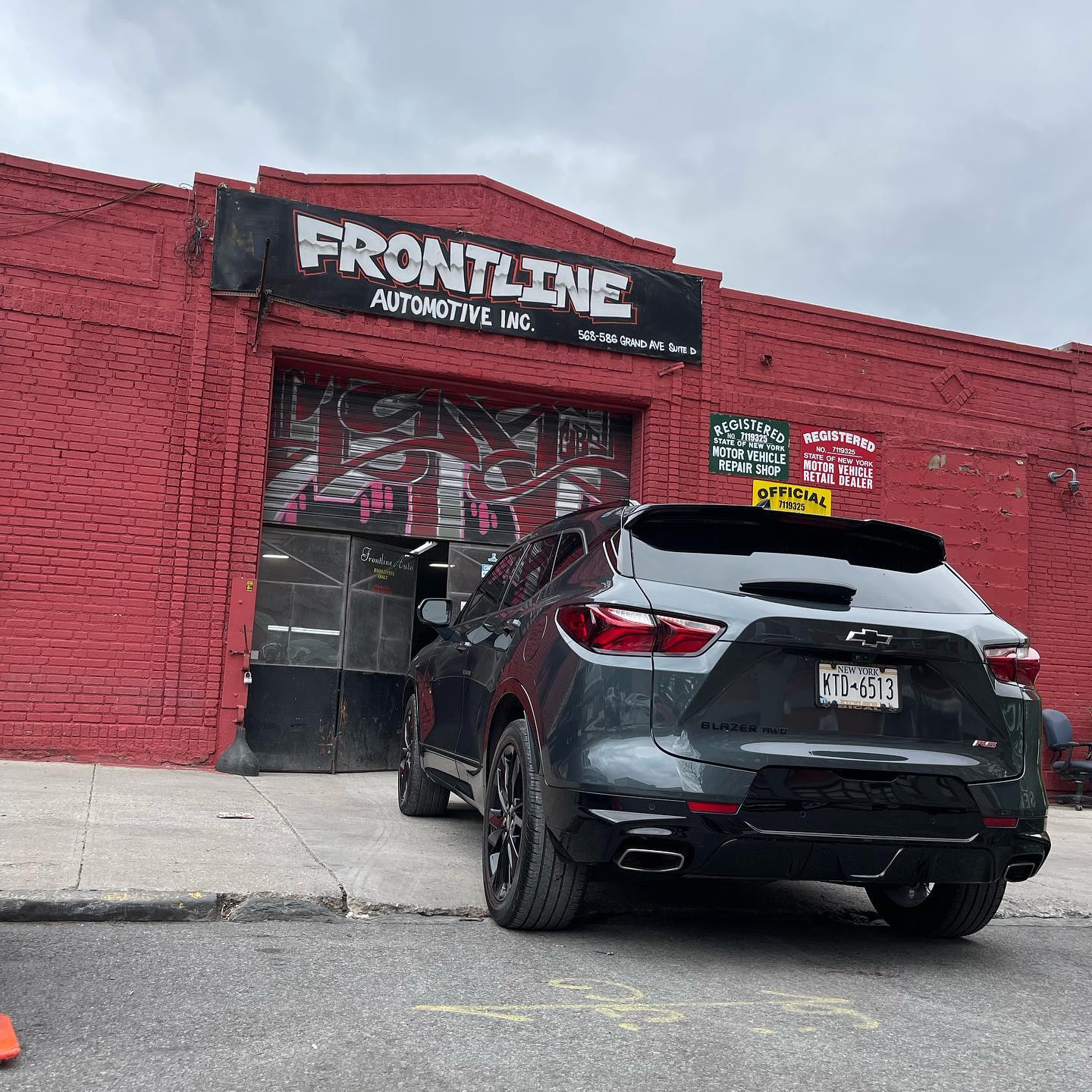 Chevrolet Blazer RS parked at Frontline Automotive storefront after repair